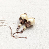 Handmade Butter Yellow Drop Earrings with Czech Crystal Pearls and Antiqued Copper Floral Accents