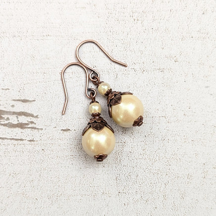 Handmade Butter Yellow Drop Earrings with Czech Crystal Pearls and Antiqued Copper Floral Accents