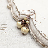Handmade Butter Yellow Drop Earrings with Czech Crystal Pearls and Antiqued Copper Floral Accents