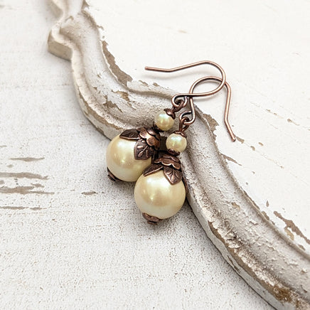 Handmade Butter Yellow Drop Earrings with Czech Crystal Pearls and Antiqued Copper Floral Accents