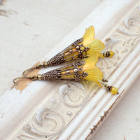 long Lucite Flower Earrings in Iridescent Golden Yellow and Orange with antiqued brass filigree