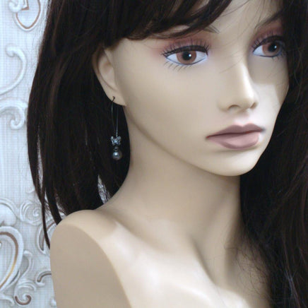 Black Metal Butterfly Crystal Earrings mannequin view