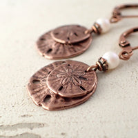 Copper Sand Dollar Dangle Earrings close up