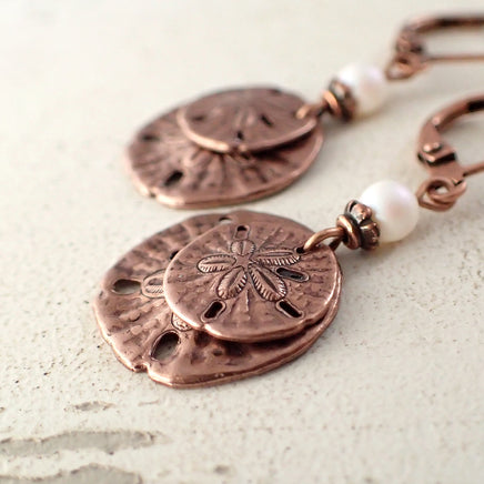 Copper Sand Dollar Dangle Earrings close up