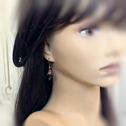 Lustered Purple and Copper Flower Dangle Earrings mannequin view