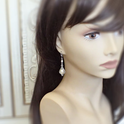 Silver Victorian Ivory Pearl Cabochon Earrings mannequin view