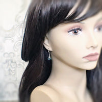 Dainty Teal and Silver Flower Earrings mannequin view