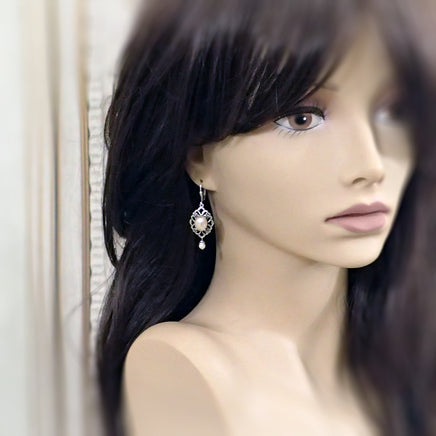 Antiqued Silver Floral Pearl Cabochon Earrings mannequin view