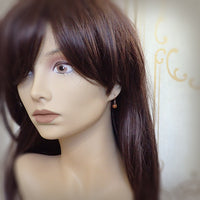 Tiny Harvest Pumpkin Earrings on model