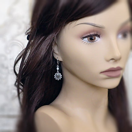 Silver Sea Shell Earrings with Pearls model view