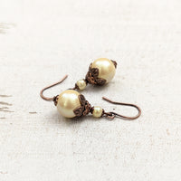 Handmade Butter Yellow Drop Earrings with Czech Crystal Pearls and Antiqued Copper Floral Accents