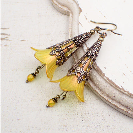 long Lucite Flower Earrings in Iridescent Golden Yellow and Orange with antiqued brass filigree