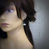 White Gothic Flower Earrings mannequin view