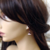 White Copper Flower Earrings mannequin view