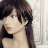 Swirly Turquoise and Copper Earrings mannequin view