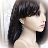 Dark Teal Victorian Sea Shell Earrings mannequin view
