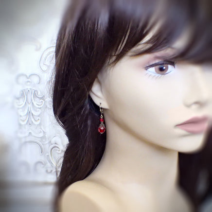 Romantic Red Victorian Style Crystal Earrings on mannequin