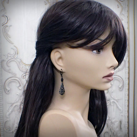 Victorian Gothic Filigree Drop Earrings on mannequin