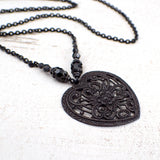 Black metal heart shaped filigree pendant necklace