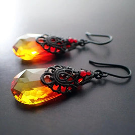 Fire Earrings with Antique Black Ox Filigree and Fire Opal Crystal Pear Drops Red, Orange, and Yellow Gothic Black Metal