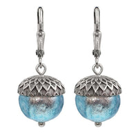 Ethereal silver and blue acorns. The glass beads are silver when viewed head on with a blue iridescence around the edges