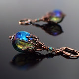 Iridescent Green Glass Teardrop Earrings with Antiqued Copper Filigree