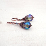 Iridescent Green Glass Teardrop Earrings with Antiqued Copper Filigree