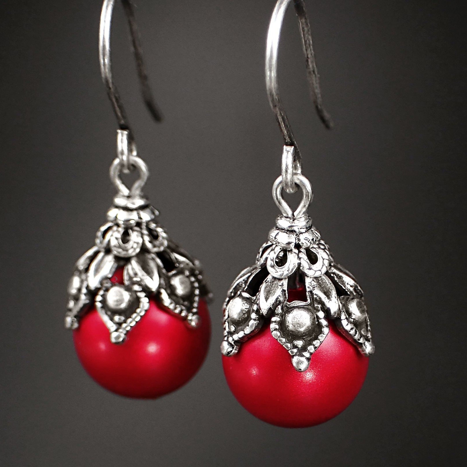 Antiqued silver filigree and adornments paired with Rouge crystal pearls, which are a soft, semi-matte, rich red hue.