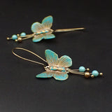 Verdigris Butterfly Earrings in Antiqued Brass