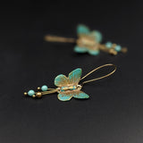 Verdigris Butterfly Earrings in Antiqued Brass
